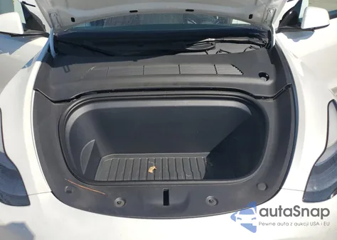 2023 Tesla Model Y from USA, damaged, VIN 7SAYGAEE7PF877589